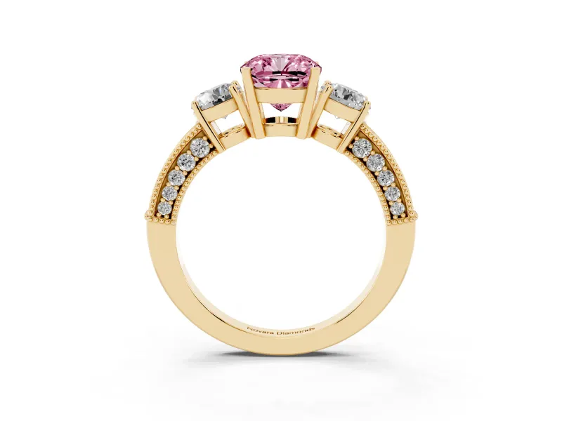 Fancy Pink Cushion Cut Diamond Three-Stone Ring Set in Yellow gold with Round Side Stones and Pavé Band