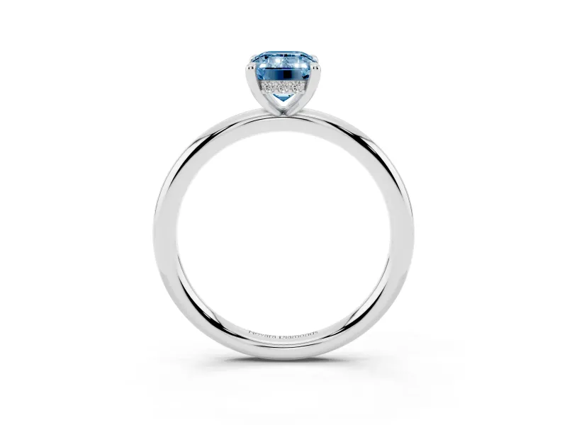 Fancy Blue Emerald Cut Diamond Solitaire Ring Set in Platinum with Thin Band and Prong Setting