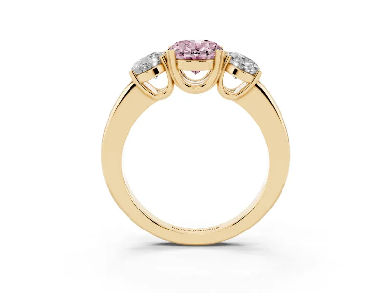 Fancy Pink Oval Cut Diamond Three-Stone Ring Set in Yellow gold with Polished Band and Prong Setting