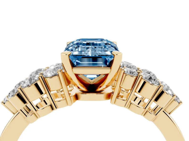 Emerald Cut Side Stone Engagement Ring Setting for a Fancy Blue Lab-Grown Diamond | Shoulder Clusters | Yellow Gold
