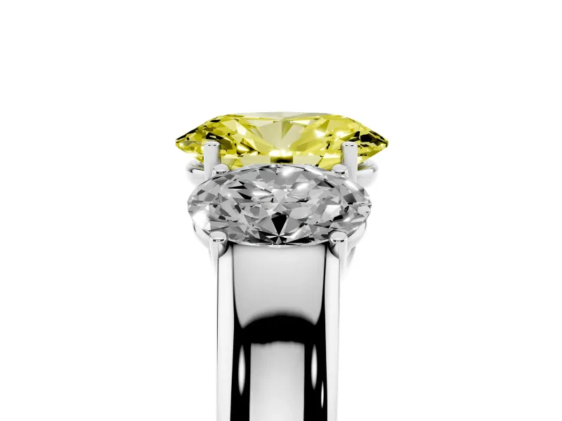 Fancy Yellow Three-Stone Oval Cut Diamond Ring Set in White gold with Matching Prong Settings and Plain Band