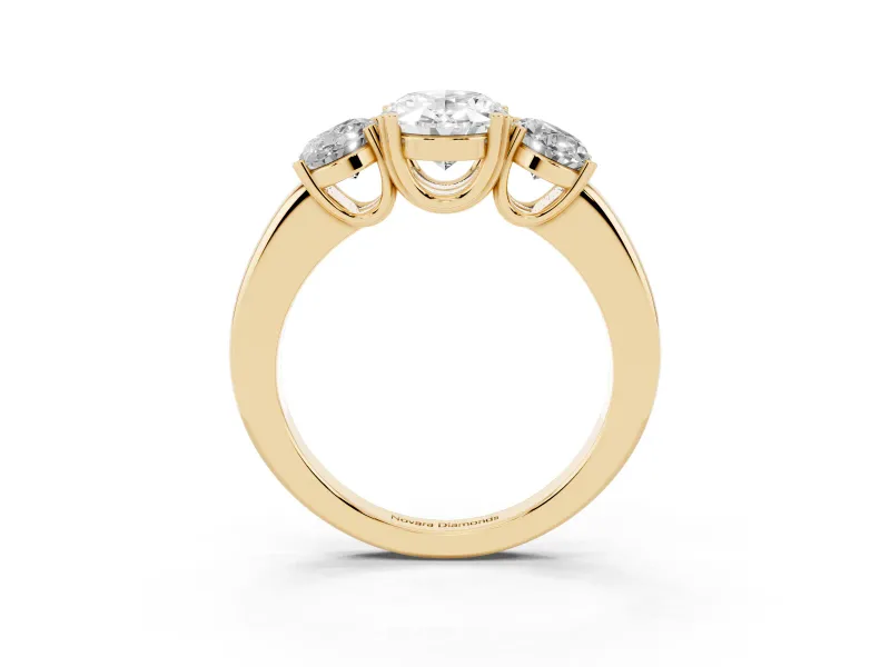 Oval Cut Diamond Three-Stone Ring Set in Yellow gold with Polished Band and Prong Setting