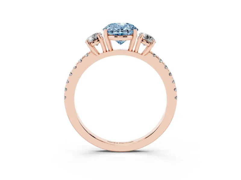 Fancy Blue Oval Cut Diamond Three-Stone Ring Set in Rose gold with Pavé Band and Graduated Sides