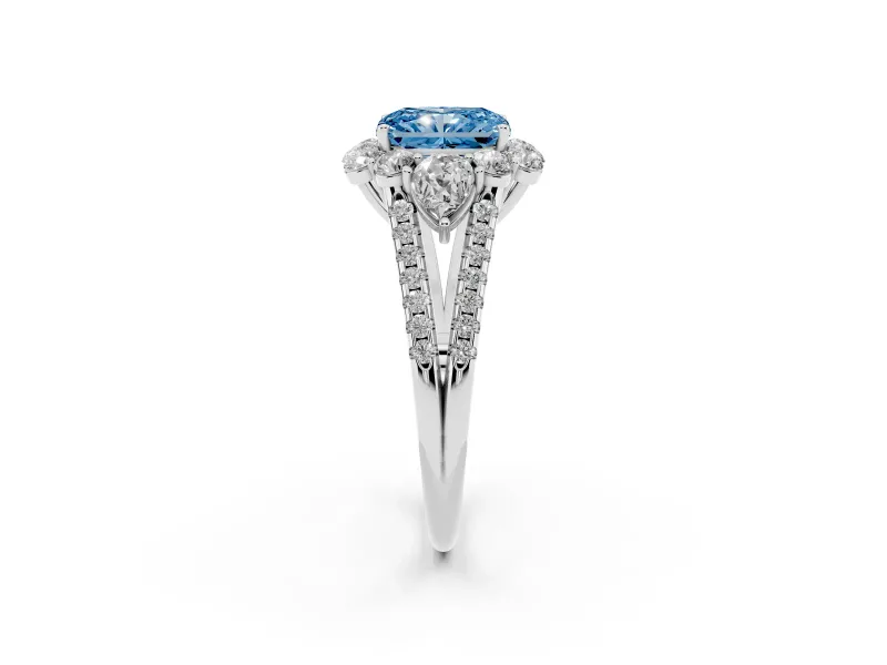 Fancy Blue Radiant Cut Diamond Halo Split Shank Engagement Ring Set in White gold with Prong-Held Center Stone