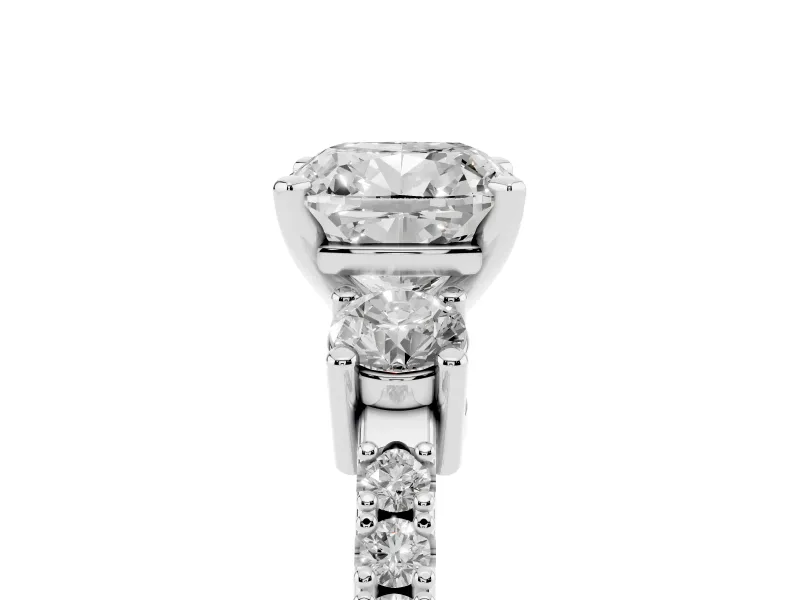 Three-Stone Cushion Cut Diamond Pavé Band Ring Set in White gold with Prong Setting