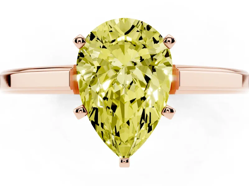 Fancy Yellow Pear Cut Diamond Solitaire Ring Set in Rose gold with Prong Setting and Classic Band