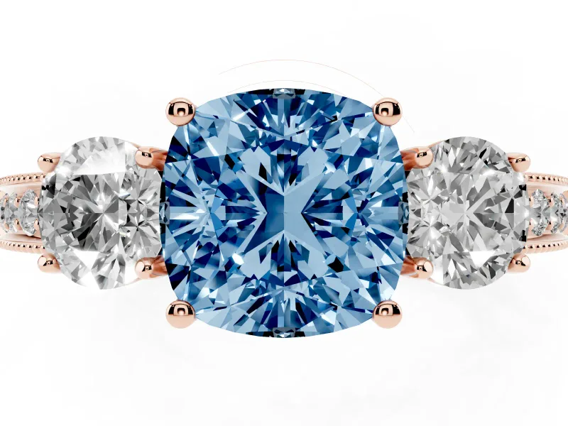 Fancy Blue Cushion Cut Diamond Three-Stone Ring Set in Rose gold with Round Side Stones and Pavé Band