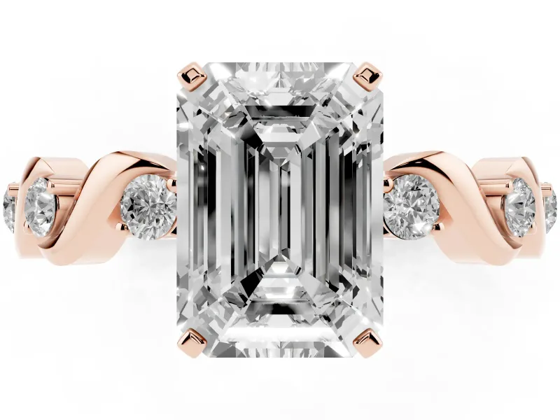 Emerald Cut Diamond Solitaire Ring Set in Rose gold with Ribbon Twist Band, Round Accents and Prong Setting