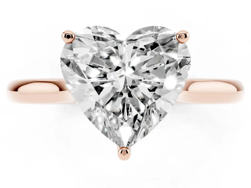 Heart Cut Diamond Solitaire Ring Set in Rose gold with Cathedral Band and Prong Setting