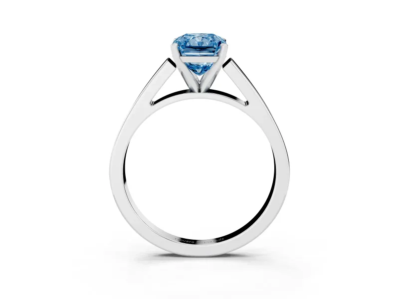 Fancy Blue Radiant Cut Diamond Solitaire Engagement Ring Set in Platinum with Prong Setting and Tapered Band