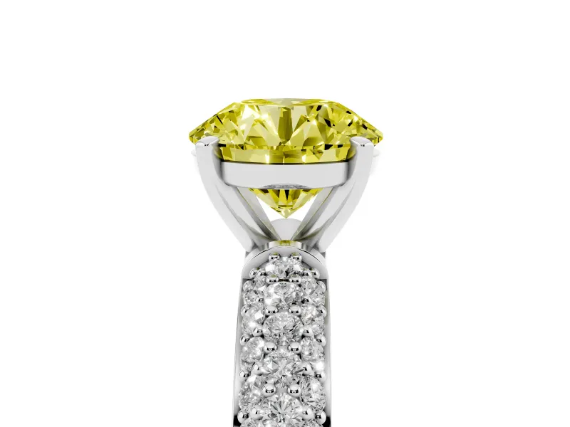 Fancy Yellow Round Cut Diamond Solitaire Ring Set in White gold with Prong Setting and Pavé-Set Band