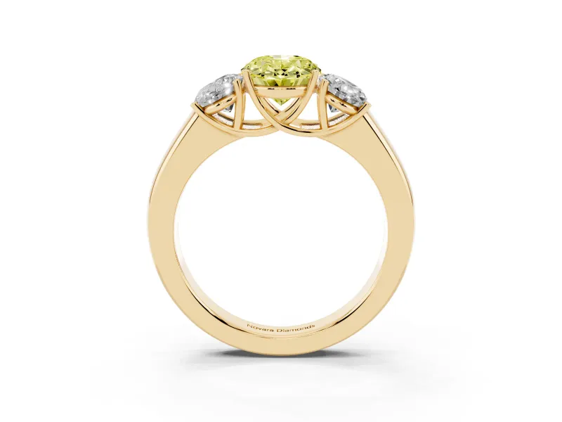 Fancy Yellow Three-Stone Oval Cut Diamond Ring Set in Yellow gold with Matching Prong Settings and Plain Band
