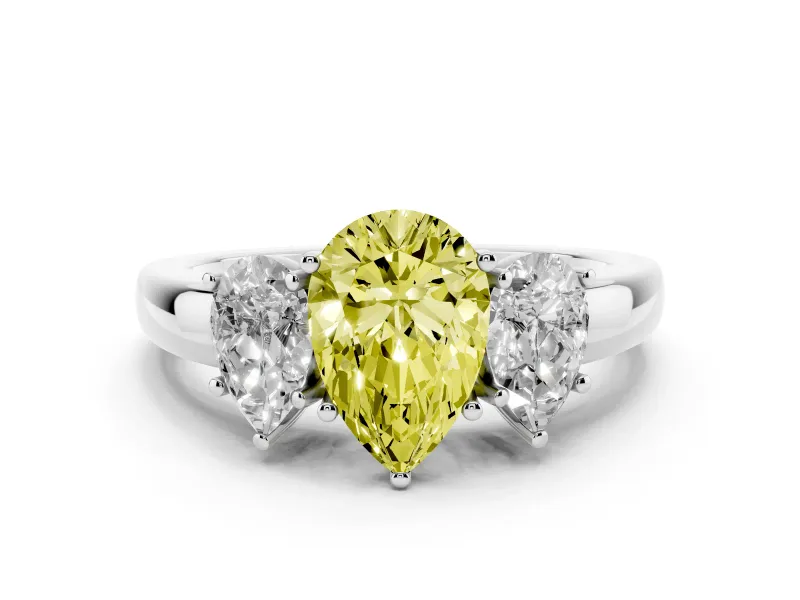 Fancy Yellow Pear Cut Diamond Three-Stone Ring Set in Platinum with Bold Center and Classic Band