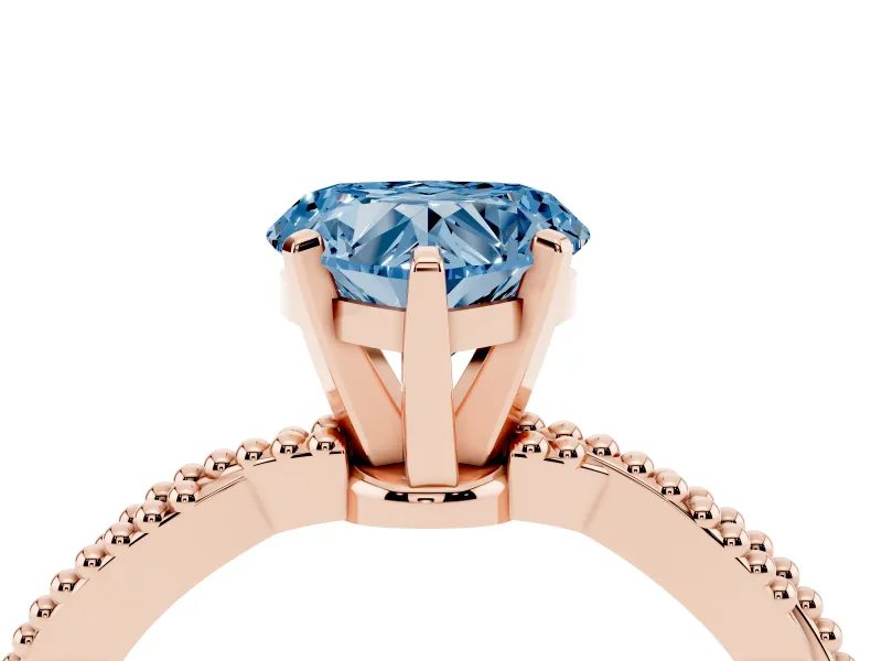 Fancy Blue Heart Cut Diamond Solitaire Ring Set in Rose gold with Twisted Band and Bead Prong Setting