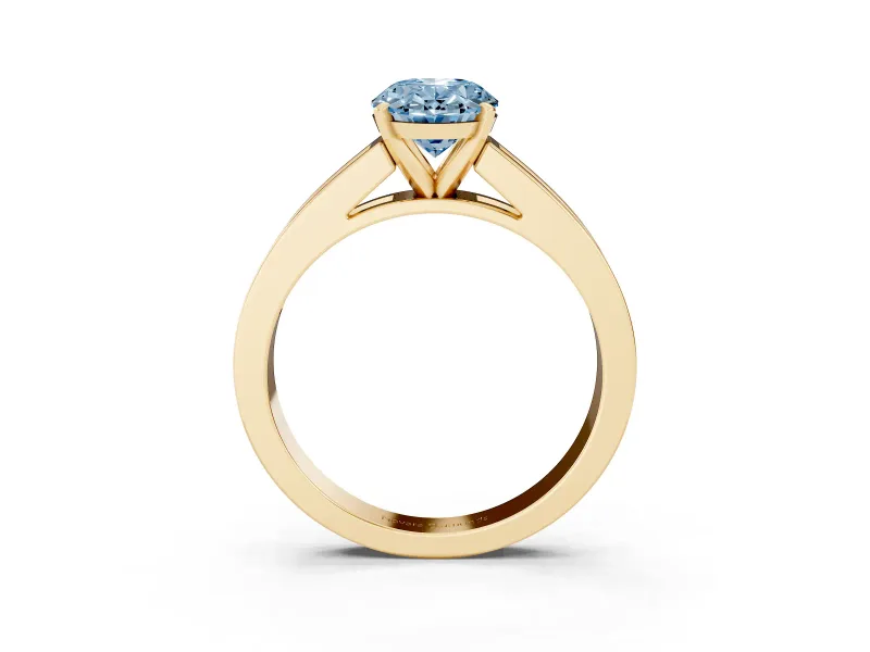 Fancy Blue Oval Cut Diamond Solitaire Ring Set in Yellow gold with Channel-Set Band and Prong Setting