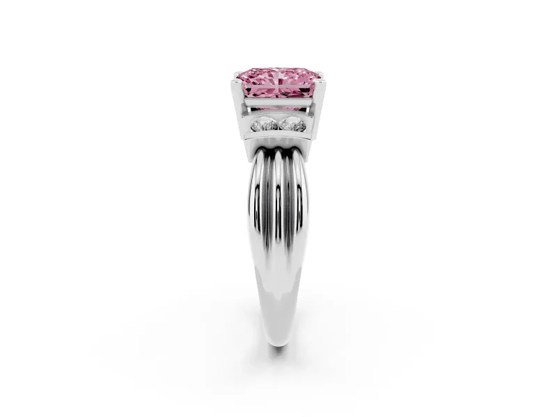 Fancy Pink Three-Stone Radiant Cut Diamond Channel Set Ring Set in Platinum with Bar Prongs
