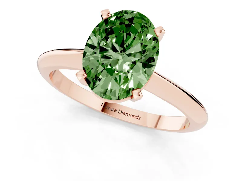 Fancy Green Oval Cut Diamond Solitaire Ring Set in Rose gold with Prong Setting on a Plain Round Band