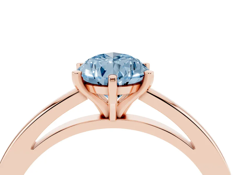 Fancy Blue Pear Cut Diamond Solitaire Engagement Ring Set in Rose gold with Prong Setting on a Classic Band