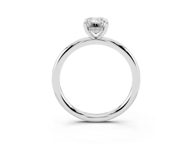 Emerald Cut Diamond Solitaire Ring Set in White gold with Thin Band and Prong Setting