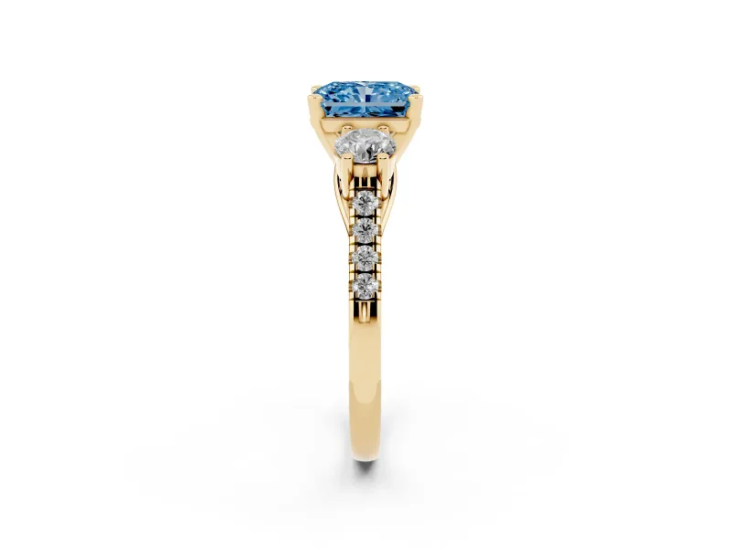Radiant Cut Three-Stone Engagement Ring Setting for a Fancy Blue Lab-Grown Diamond | Yellow Gold