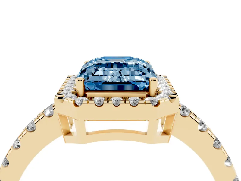 Fancy Blue Emerald Cut Diamond Halo Ring Set in Yellow gold with Delicate Pavé Band and Prong Setting
