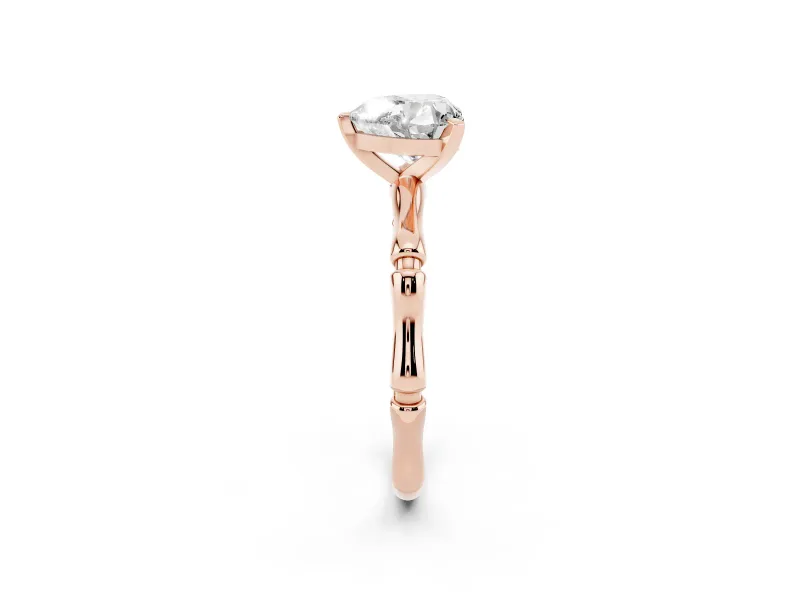 Heart Cut Diamond Solitaire Ring Set in Rose gold with Bamboo Band and Prong Setting