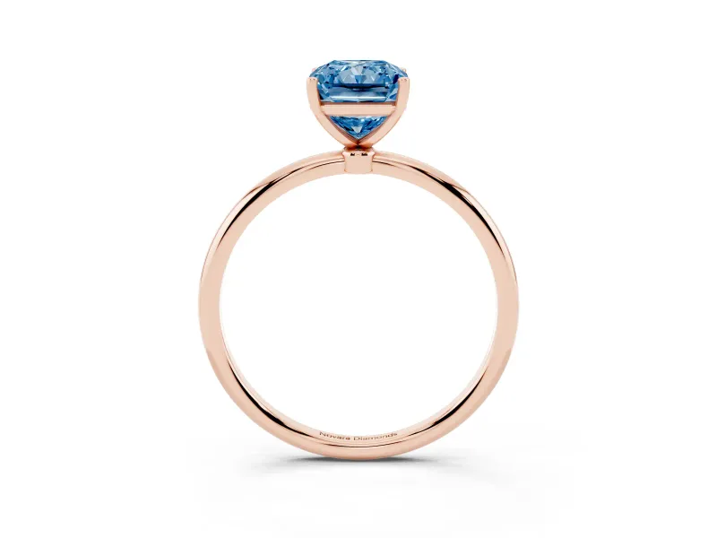 Fancy Blue Radiant Cut Diamond Solitaire Engagement Ring Set in Rose gold with Thin Band and Prong Setting