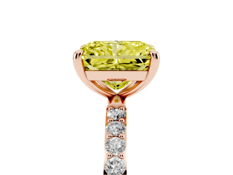Fancy Yellow Radiant Cut Diamond Solitaire Ring Set in Rose gold with Round Pavé Band and Prong Setting