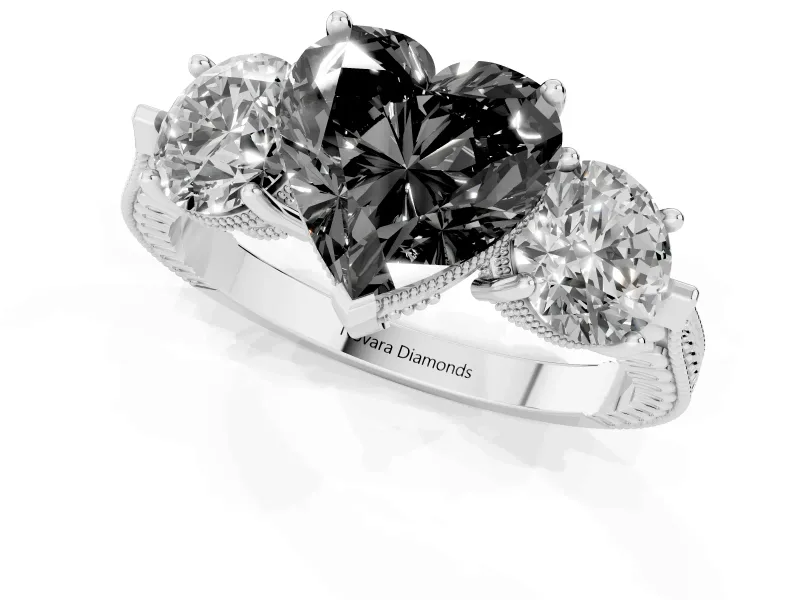 Fancy Black Heart Cut Diamond Three-Stone Ring Set in White gold with Milgrain Band