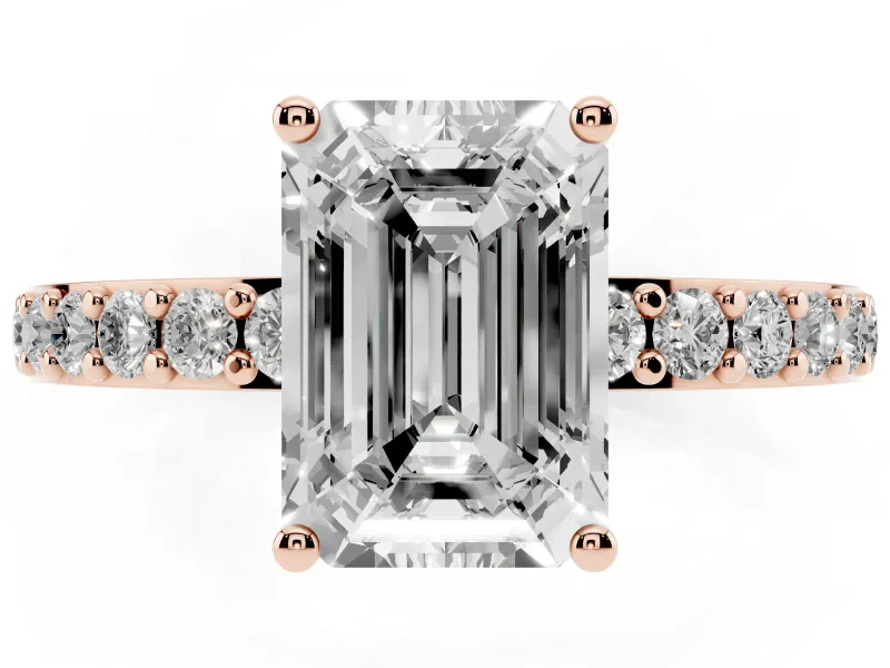 Emerald Cut Diamond Solitaire Set in Rose gold with Round Pavé Band and Prong Setting