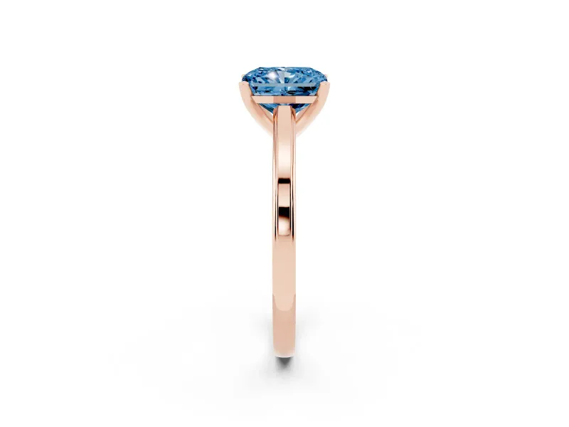 Fancy Blue Radiant Cut Diamond Solitaire Ring Set in Rose gold with Prong Setting and Classic Band