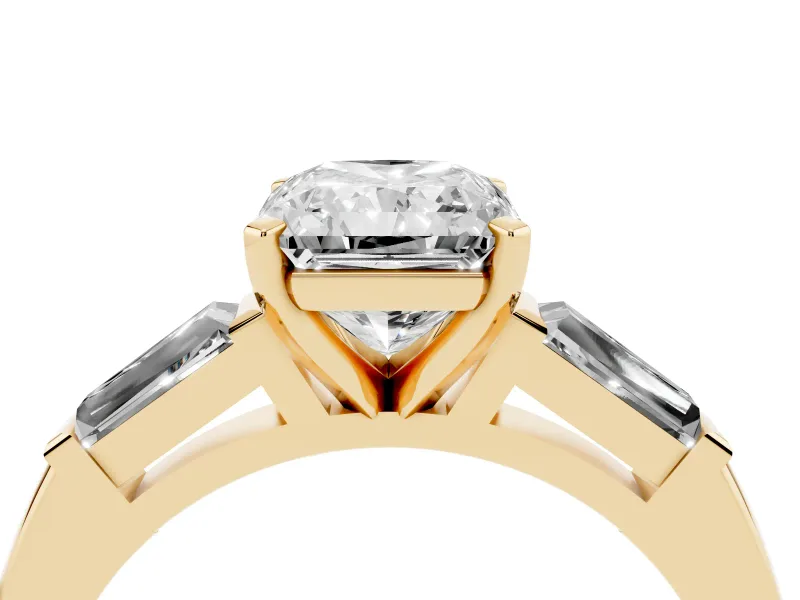 Radiant Cut Diamond Solitaire Ring Set in Yellow gold with Tapered Baguette Side Stones and Prong Setting