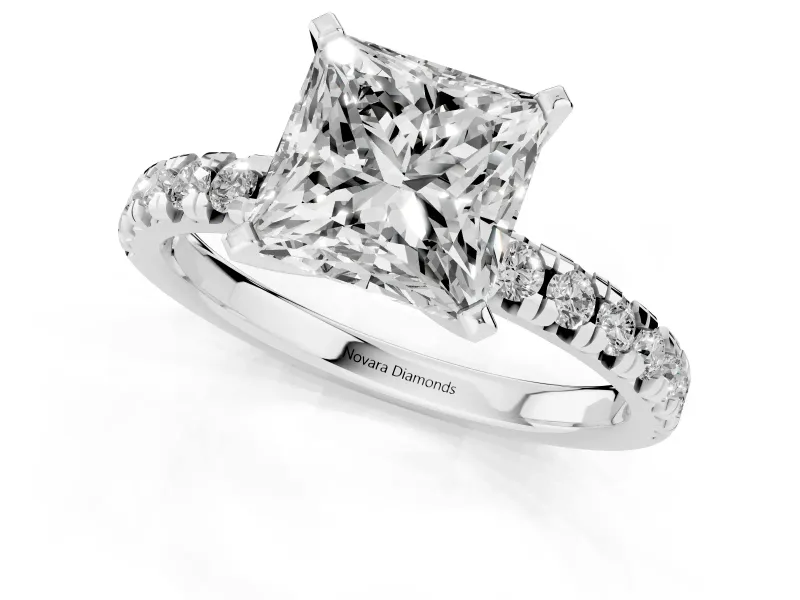 Princess Cut Diamond Solitaire Pavé Engagement Ring Set in White gold with Round Band and Prong Setting