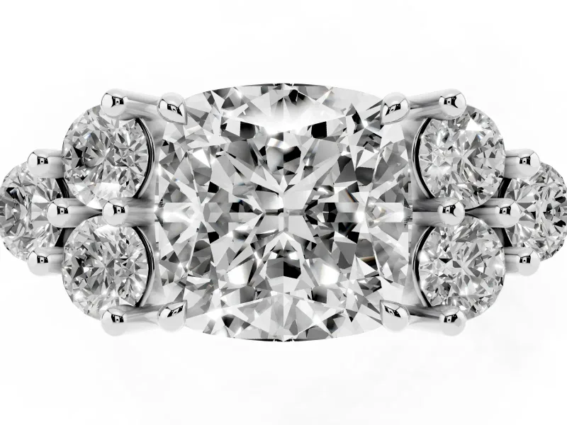 Cushion Cut Diamond Solitaire Ring Set in White gold with Cluster Accents on Each Side