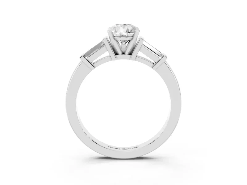 Pear Cut Diamond Solitaire Ring Set in Platinum with Tapered Baguette Accents and Prong Setting