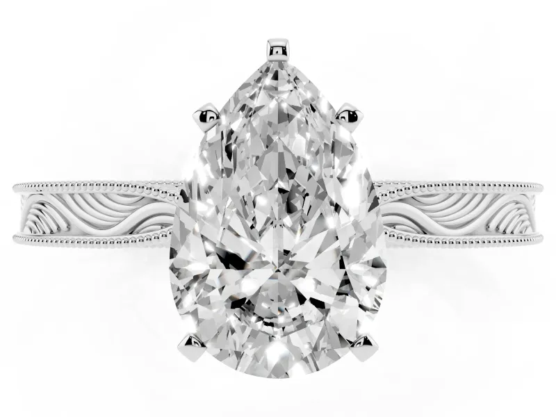 Pear Cut Diamond Solitaire Milgrain Engraved Band Set in White gold with Prong Setting