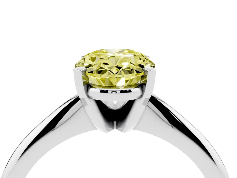Fancy Yellow Oval Cut Diamond Solitaire Ring Set in White gold with Prong Setting on a Plain Round Band