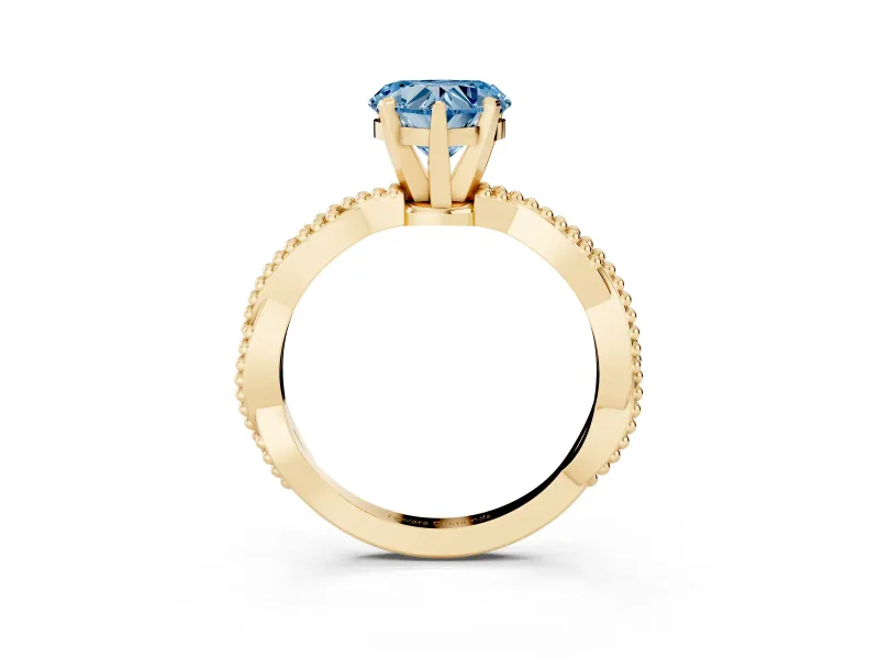 Fancy Blue Heart Cut Diamond Solitaire Ring Set in Yellow gold with Twisted Band and Bead Prong Setting