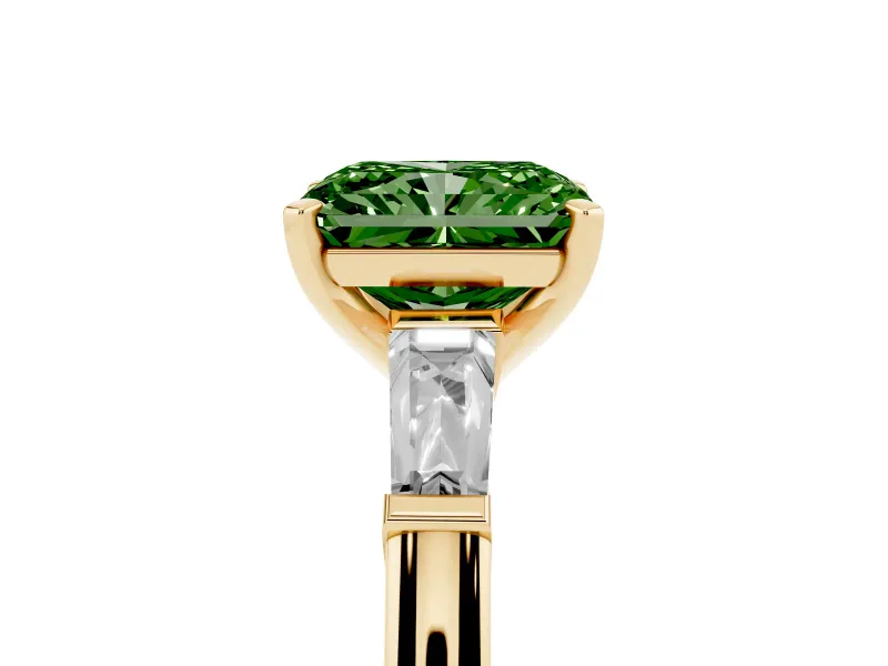 Fancy Green Radiant Cut Diamond Solitaire Ring Set in Yellow gold with Tapered Baguette Side Stones and Prong Setting