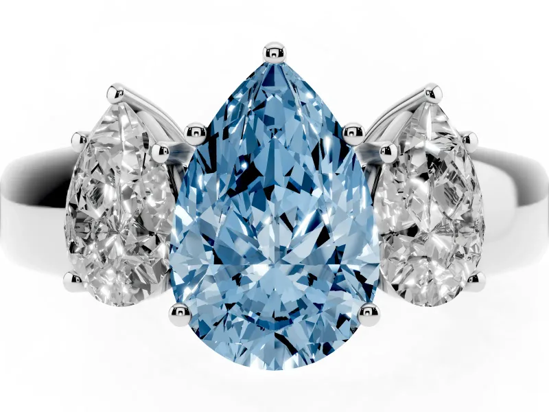 Fancy Blue Three-Stone Pear Cut Diamond Ring Set in White gold with Matching Prong Settings and Plain Band