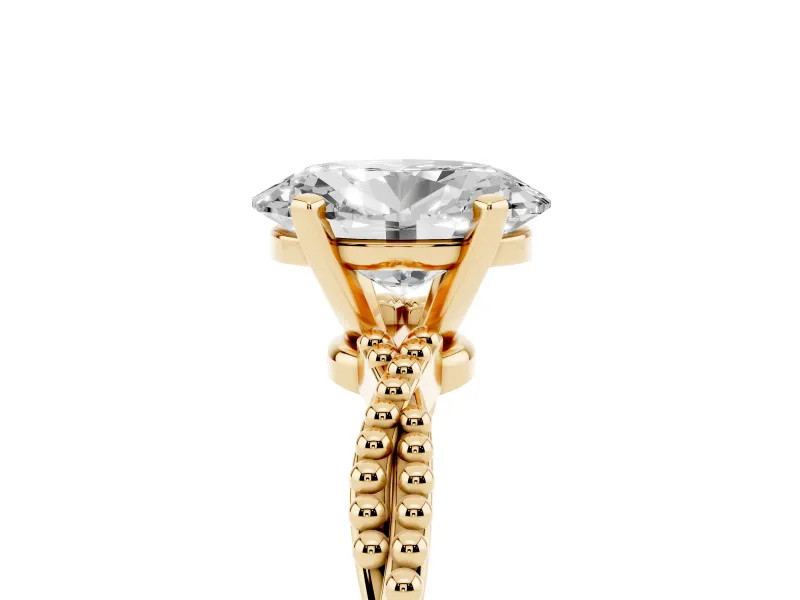 Oval Cut Diamond Solitaire Ring Set in Yellow gold with Twisted Band and Bead Prong Setting