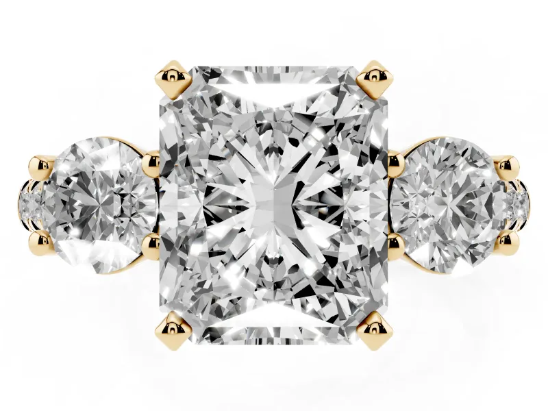 Three-Stone Radiant Cut Diamond Pavé Band Ring Set in Yellow gold with Prong-Set Trio