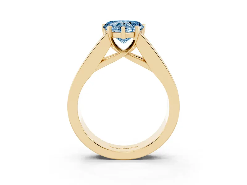 Fancy Blue Heart Cut Diamond Solitaire Ring Set in Yellow gold with Channel-Set Accent Stones and Prong Setting