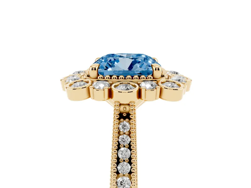 Fancy Blue Cushion Cut Diamond Halo Milgrain Pavé Ring Set in Yellow gold with Prong Setting