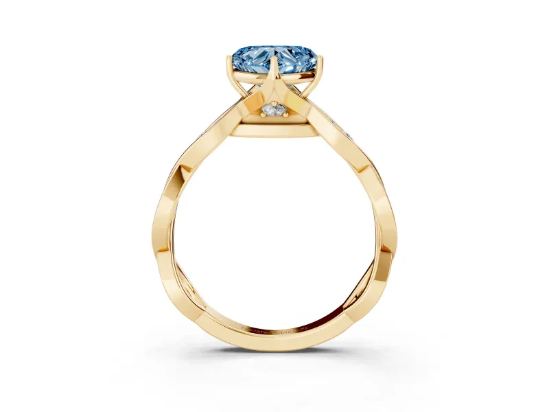 Fancy Blue Heart Cut Diamond Twist Band Solitaire Ring Set in Yellow gold with Leaf Prong Setting and Accent Stones