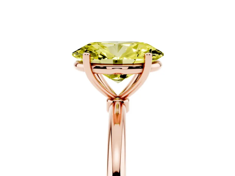Fancy Yellow Oval Cut Diamond Solitaire Engagement Ring Set in Rose gold with Thin Band and Prong Setting