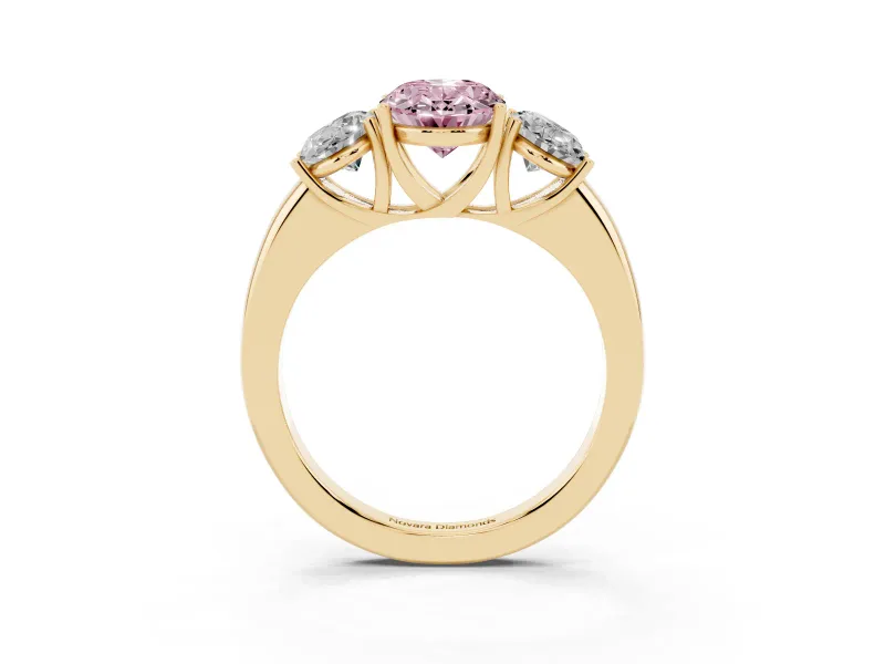 Fancy Pink Oval Cut Diamond Three-Stone Ring Set in Yellow gold with Bold Center and Classic Band