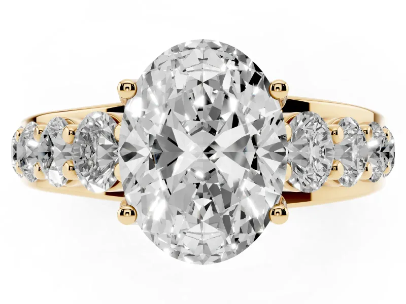 Oval Cut Diamond Pavé Engagement Ring Set in Yellow gold with Prong Setting