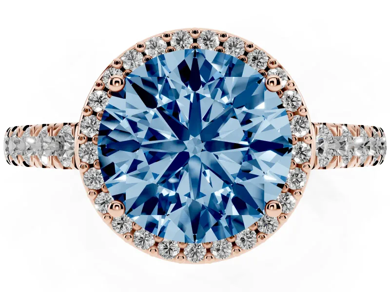 Fancy Blue Round Cut Diamond Halo Engagement Ring Set in Rose gold with Pavé Band and Prong Setting