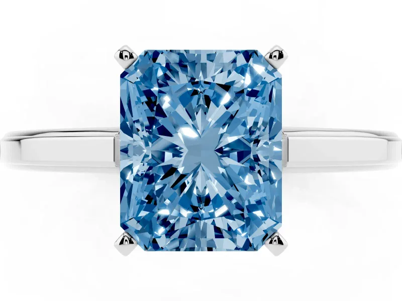 Fancy Blue Radiant Cut Diamond Solitaire Ring Set in White gold with Prong Setting and Classic Band